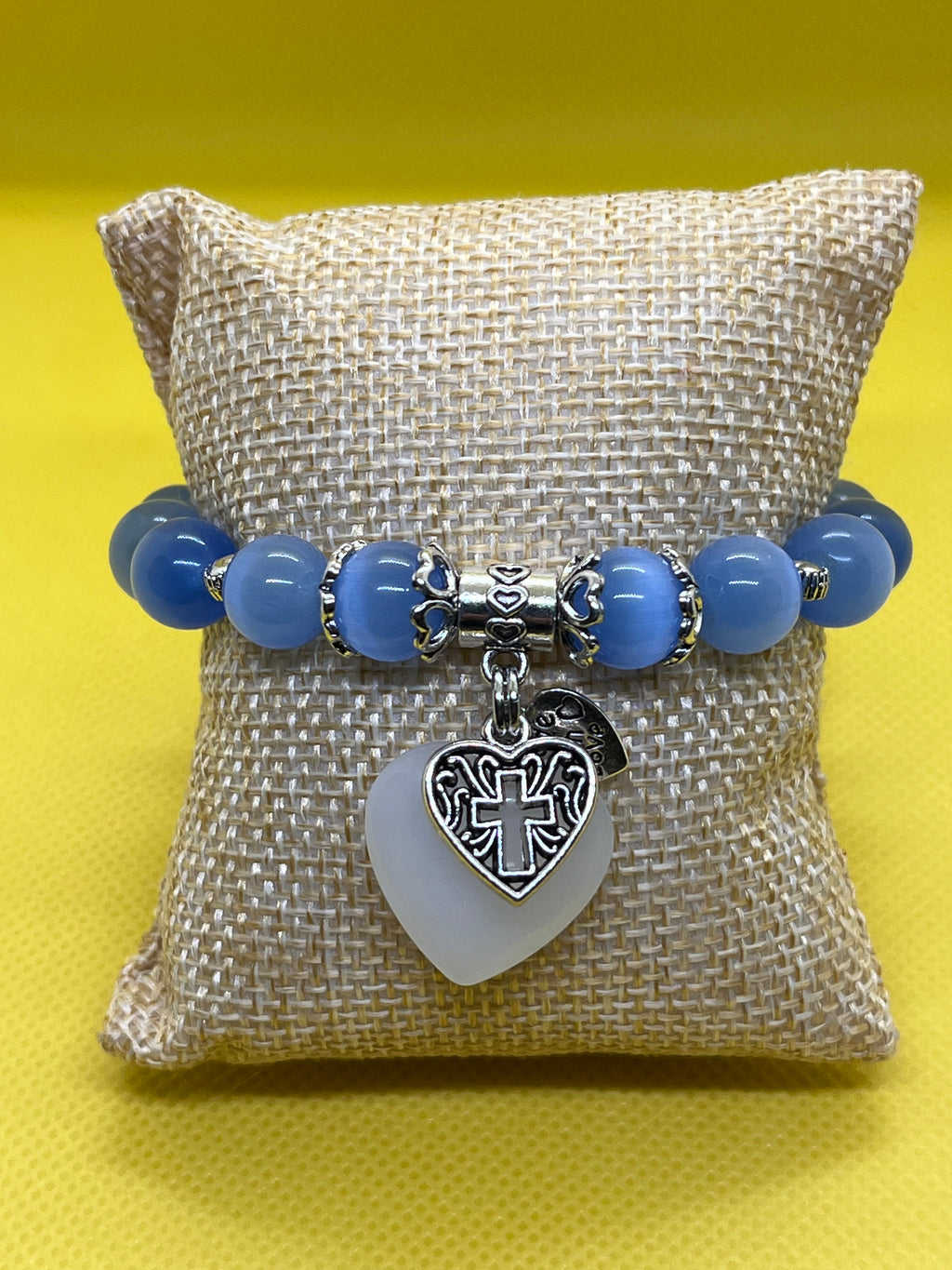 "Handmade Light Blue Cat's Eye beaded bracelet with charm, String & Soul"