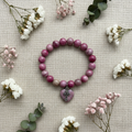 Pink Rhodonite Flat Lay